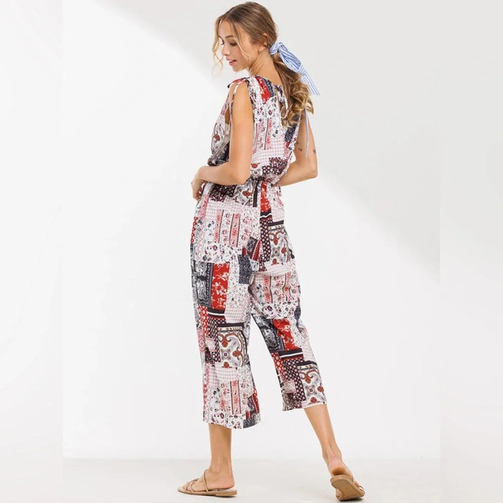 D231 Women’s Sleeveless V-Neck Surplice Multi Print Jumpsuit with Pockets